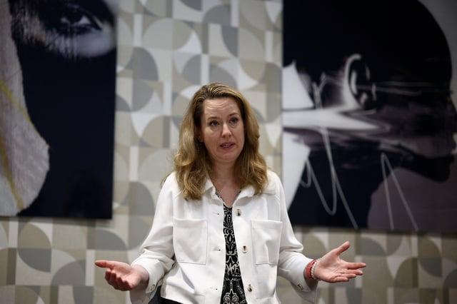 Director General of the International Organization for Migration (IOM) Amy Pope gestures as she speaks during an interview with Reuters in Rome, Italy, July 11, 2025. REUTERS/Guglielmo Mangiapane