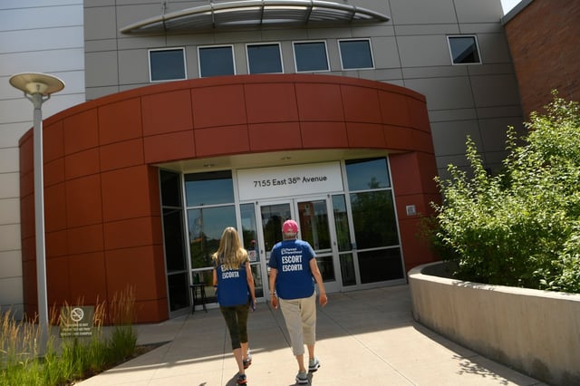 Volunteer escorts wait to assist incoming patients outside of the Planned Parenthood on July 18, 2019 in Denver, Colorado. With recent restrictions to abortions in other states Planned Parenthood has seen an increase in women coming to Colorado from out of state. Planned Parenthood&#39;s Colorado locations served women from 34 states last year and one in 10 abortions was for someone who crossed state lines. (Photo by Helen H. Richardson/The Denver Post)