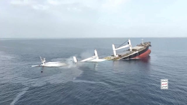 A vessel said to be Greek-operated, Liberia-flagged Eternity C sinks in a footage released by Yemen's Houthis, in the Red Sea, in this screen grab taken from a handout video released on July 9, 2025. HOUTHI MEDIA CENTER/Handout via REUTERS/File Photo