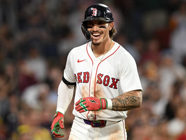 BOSTON, MASSACHUSETTS - JULY 08: Jarren Duran #16 of the Boston Red Sox reacts after hitting a solo home run against the Colorado Rockies during the seventh inning at Fenway Park on July 08, 2025 in Boston, Massachusetts.