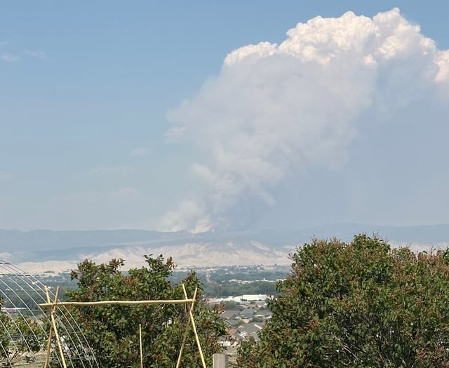 Smoke from two wildfires burning in Black Canyon of the Gunnison National Park on Thursday, July 10, 2025, rises in the distance, as seen from Montrose. (Tiney Ricciardi / The Denver Post)