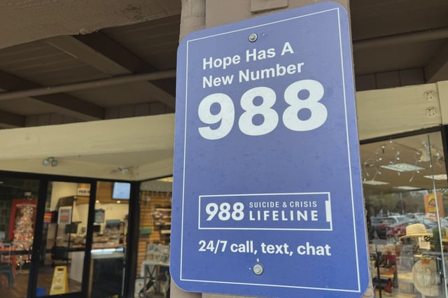 Sign for the 988 Lifeline mental health emergency hotline.