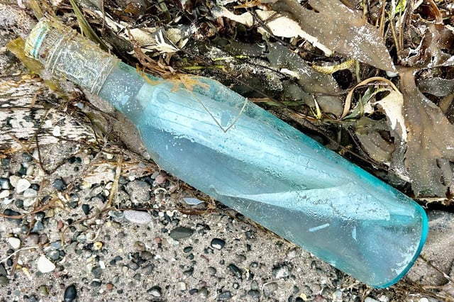 Bottle with a message inside found by Kate and Jon Gay on Scraggane Bay
