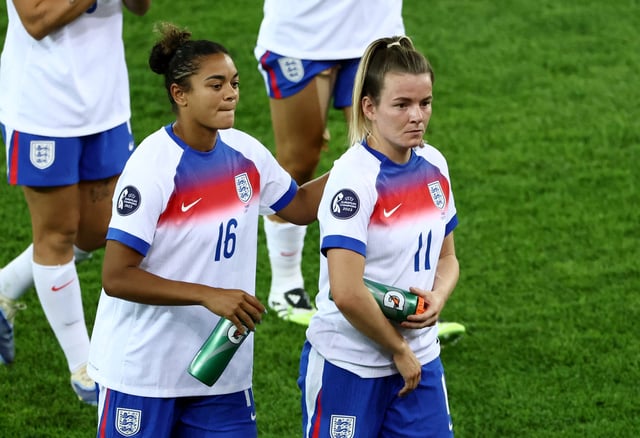 Soccer Football - UEFA Women's Euro 2025 - Group D - France v England - Stadion Letzigrund, Zurich, Switzerland - July 5, 2025 England's Jessica Carter and Lauren Hemp look dejected after the match REUTERS/Stephane Mahe/File Photo