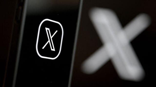 This illustration photograph shows the logo of social network X (formerly Twitter) displayed on a smartphone.