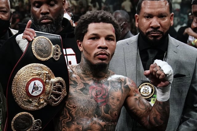 Gervonta Davis poses for photographs after a WBA lightweight championship boxing bout against Rolando Romero early Sunday, May 29, 2022, in New York.