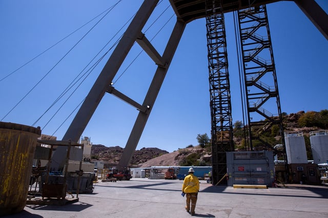 A mine worker walks toward the mine shaft at the Resolution Copper exploratory mine shaft 10 facility in Superior, Arizona, U.S., March 30, 2021. Picture taken March 30, 2021.  REUTERS/Caitlin O'Hara/File Photo