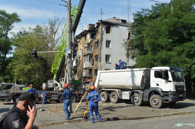 KYIV, July 10, 2025  Emergency workers demolish a damaged residential building at the site of an air strike in the Shevchenkivskyi district of Kyiv, Ukraine, July 10, 2025. 