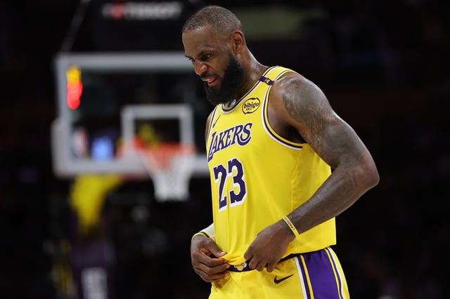 LeBron James #23 of the Los Angeles Lakers walks across the court in the fourth quarter against the Minnesota Timberwolves in Game Two of the Western Conference First Round NBA Playoffs at Crypto.com Arena on April 22, 2025 in Los Angeles, California.