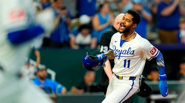 Kansas City Royals third baseman Maikel Garcia (11) celebrates as he scores the winning run during the ninth inning against the Pittsburgh Pirates at Kauffman Stadium on July 8, 2025.