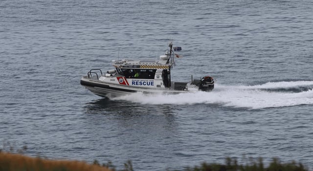 Marine Rescue NSW crews searched the waters from Bare Point in the north to Freshwater Beach in the south for a missing 19-year-old surfer.