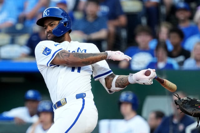 KANSAS CITY, MISSOURI - JULY 09: Maikel Garcia #11 of the Kansas City Royals hits a double in the fourth inning against the Pittsburgh Pirates at Kauffman Stadium on July 09, 2025 in Kansas City, Missouri.