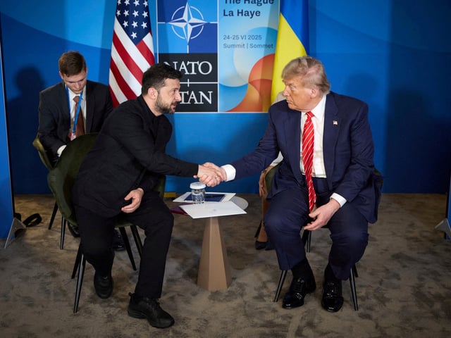 U.S. President Donald Trump and Ukraine's President Volodymyr Zelenskiy shake hands as they attend a meeting on the sidelines of NATO summit in The Hague, Netherlands June 25, 2025. Ukrainian Presidential Press Service/Handout via REUTERS ATTENTION EDITORS - THIS IMAGE HAS BEEN SUPPLIED BY A THIRD PARTY.     TPX IMAGES OF THE DAY
