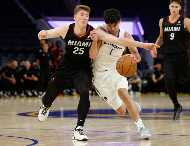 Golden State Warriors’ Taran Armstrong (1) dribbles against Miami Heat’s Kasparas Jakucionis (25) in the third quarter of their California Classic Summer League game at Chase Center in San Francisco, Calif., on Tuesday, July 8, 2025. (Nhat V. Meyer/Bay Area News Group)