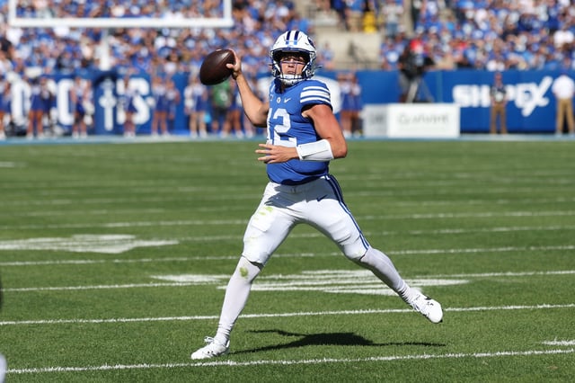 Oct 12, 2024; Provo, Utah, USA; Brigham Young Cougars quarterback Jake Retzlaff (12) prepares to pass against the Arizona Wildcats during the first quarter at LaVell Edwards Stadium. Mandatory Credit: Rob Gray-Imagn Images/File Photo