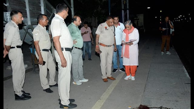 Police and GRP officials at the crime site at Rohtak railway station on Friday. here after an ex-serviceman fired shots at a woman. (Manoj Dhaka/HindustanTime)