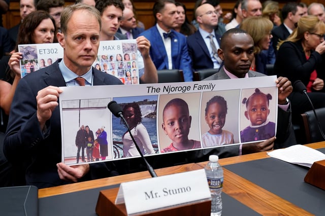 Michael Stumo, father of Samya Stumo, victim of Flight ET302; and Paul Njoroge  hold a combination photo of Njoroge’s family members who were victims of EA Flight 302 during a House Transportation and Infrastructure Aviation Subcommittee hearing on  "State of Aviation Safety" on Capitol Hill in Washington, U.S., July 17, 2019. REUTERS/Joshua Roberts/File Photo
