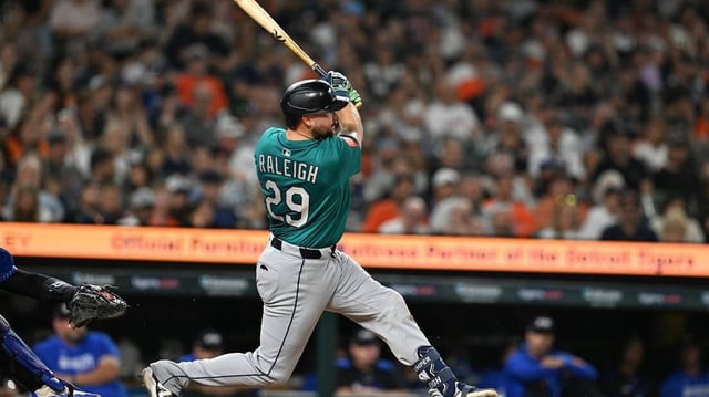 Seattle Mariners designated hitter Cal Raleigh (29) hits a grand slam home run against the Detroit Tigers in the ninth inning July 11, 2025, at Comerica Park in Detroit, Michigan.