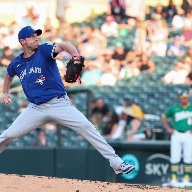 Toronto Blue Jays pitcher Max Scherzer throws to the Athletics during the first inning of a baseball game Friday, July 11, 2025, in West Sacramento, Calif. (AP Photo/Sara Nevis)