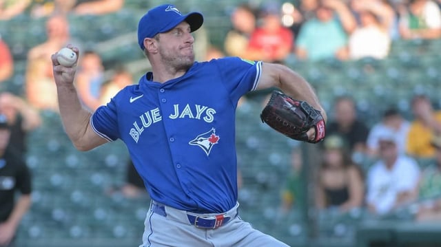 Jul 11, 2025; West Sacramento, California, USA; Toronto Blue Jays pitcher Max Scherzer (31) throws a pitch against the Athletics during the first inning at Sutter Health Park. Mandatory Credit: Ed Szczepanski-Imagn Images