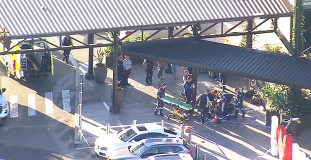 A man has been shot in a shopping centre.