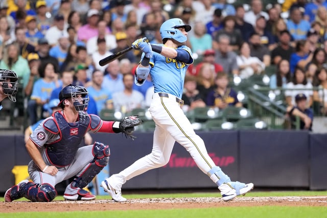 Jul 11, 2025; Milwaukee, Wisconsin, USA;  Milwaukee Brewers designated hitter Christian Yelich (22) hits a home run during the third inning against the Washington Nationals at American Family Field.  Jeff Hanisch-Imagn Images