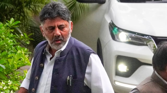 Karnataka deputy chief minister DK Shivakumar arrives at the residence of Congress leader Randeep Surjewala, in New Delhi, Thursday, July 10.`