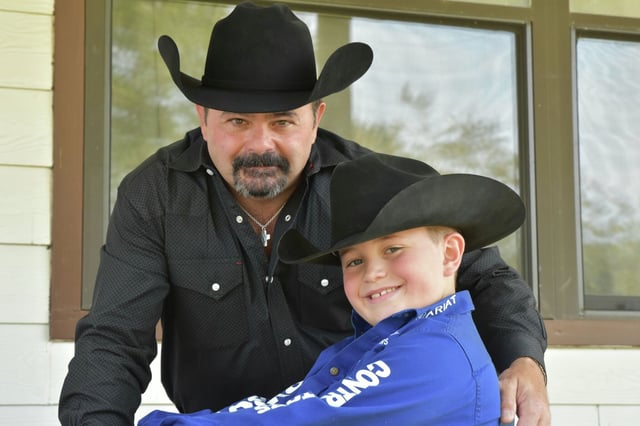 Shiloh Wilson, 12, with his dad, Jeff Wilson. They and his mother, Amber, died in last weekend&#39;s Hill Country flood.