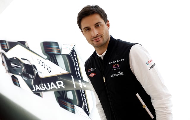 Mitch Evans, Formula E racing driver for the Jaguar TCS Racing team, poses for a photo at the new technical headquarters of Jaguar TCS Racing in Kidlington, Britain, November 30, 2023.  REUTERS/Peter Cziborra/File Photo