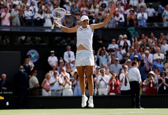 Tennis - Wimbledon - All England Lawn Tennis and Croquet Club, London, Britain - July 12, 2025 Poland's Iga Swiatek celebrates winning the women's singles final at Wimbledon REUTERS/Stephanie Lecocq     TPX IMAGES OF THE DAY