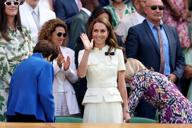 Princess Kate waves before the ladies' singles final match at Wimbledon 2025 at All England Lawn Tennis and Croquet Club on July 12, 2025, in London.
