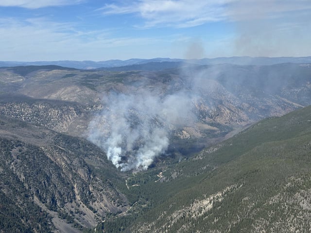 A wildfire, seen in this handout photo, burning near Keremeos, B.C., on Friday, July 11, 2025, grew to an estimated 50 hectares in size overnight, prompting an evacuation alert. THE CANADIAN PRESS/Handout - BC Wildfire Service (Mandatory Credit)