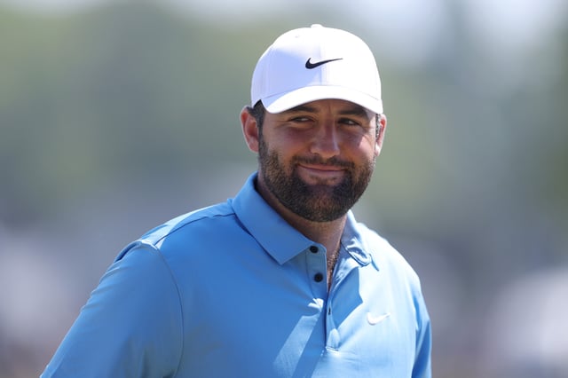 Scottie Scheffler of the United States smiles as he warms up on the driving range on day three of the Genesis Scottish Open 2025 at The Renaissance Club on July 12, 2025 in North Berwick, Scotland.