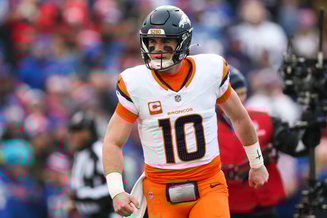 Bo Nix #10 of the Denver Broncos celebrates after a touchdown against the Buffalo Bills during the first quarter during the AFC Wild Card Playoffs at Highmark Stadium on January 12, 2025 in Orchard Park, New York.