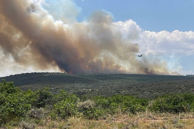 This photo provided by the National Parks Service shows smoke from wildfires in the Black Canyon of Gunnison National Park in Colorado on Thursday, July 10, 2025, after high temperatures, very low humidity, gusty winds, and very dry vegetation across the region led to extreme fire danger. (NPS via AP)