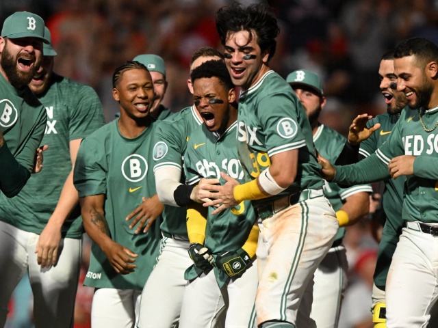 Ceddanne Rafaela #3 of the Boston Red Sox celebrates with teammates after hitting a two-run walk off home run against the Tampa Bay Rays during the ninth inning at Fenway Park on July 11, 2025 in Boston, Massachusetts. (Photo by Brian Fluharty/Getty Images)