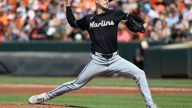 Jul 12, 2025; Baltimore, Maryland, USA; Miami Marlins pitcher Janson Junk (26) throws during the first inning against the Baltimore Orioles at Oriole Park at Camden Yards. Mandatory Credit: Daniel Kucin Jr.-Imagn Images