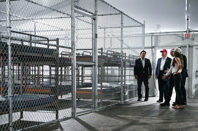 President President Donald Trump, Florida Gov. Ron DeSantis and Secretary of Homeland Security Kristi Noem tour the migrant detention center dubbed "Alligator Alcatraz in Ochopee, Florida, on July 1.