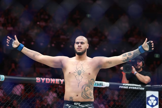 Tallison Teixeira of Brazil celebrates his victory over Justin Tarfa of New Zealand during UFC 312 at Qudos Bank Arena on February 09, 2025 in Sydney, Australia.