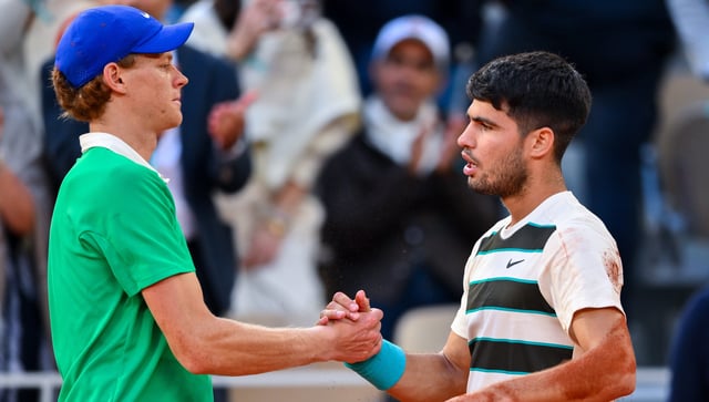 PARIS, FRANCE – JUNE 08: Carlos Alcaraz of Spain shakes hands with Jannik Sinner of Italy following the Men’s Singles Final match on Day Fifteen of the 2025 French Open at Roland Garros on June 08, 2025 in Paris, France. (Photo by Franco Arland/Getty Images)
