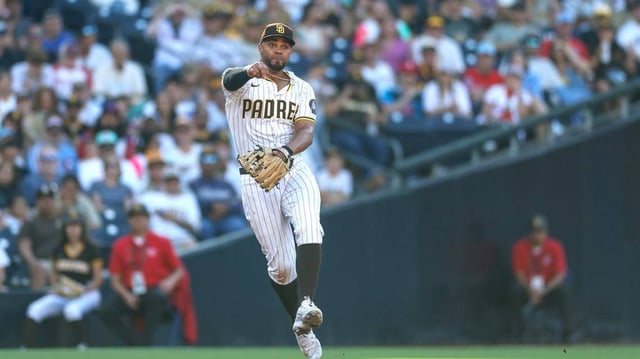 Jul 12, 2025; San Diego, California, USA; San Diego Padres shortstop Xander Bogaerts (2) makes the throw to first base for an out during the fourth inning against the Philadelphia Phillies at Petco Park. Mandatory Credit: David Frerker-Imagn Images