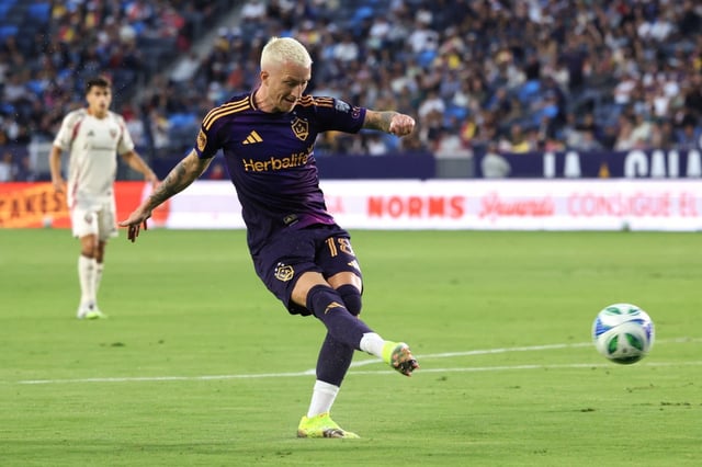 L.A. Galaxy midfielder Marco Reus kicks the ball for a goal against the D.C. United during the first half of an MLS match at Dignity Health Sports Park in Carson, Calif. on Saturday, July 12, 2025.  (Photo by Raul Romero Jr., Contributing Photographer)
