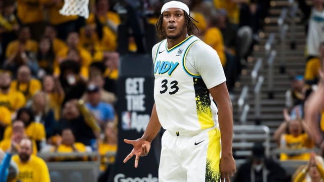 Apr 19, 2025; Indianapolis, Indiana, USA; Indiana Pacers center Myles Turner (33) celebrates a made basket in the second half against the Milwaukee Bucks at Gainbridge Fieldhouse. Trevor Ruszkowski-Imagn Images