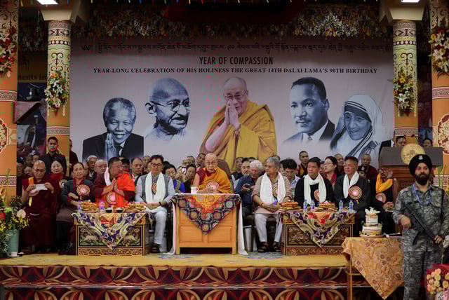 Actor Richard Gere, India's Minister of Parliamentary Affairs, Kiren Rijiju, Chief Minister of Arunachal Pradesh, Pema Khandu, and Sikyong of the Central Tibetan Administration, Penpa Tsering, sit with Tibetan spiritual leader, the 14th Dalai Lama, as he speaks during his 90th birthday celebration at the Tsuglagkhang, also known as the Dalai Lama Temple complex, in the northern town of Dharamshala, India, July 6, 2025. REUTERS/Anushree Fadnavis/File Photo