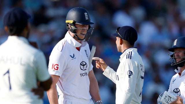 England's Zak Crawley clashes with India's Shubman Gill 