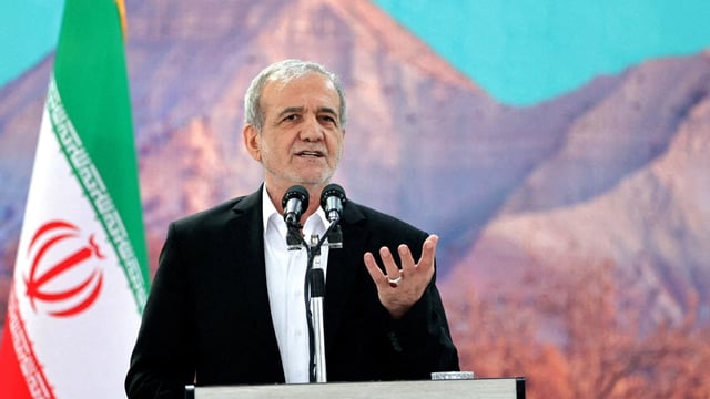 Iranian President Masoud Pezeshkian speaks during a meeting in Ilam, Iran