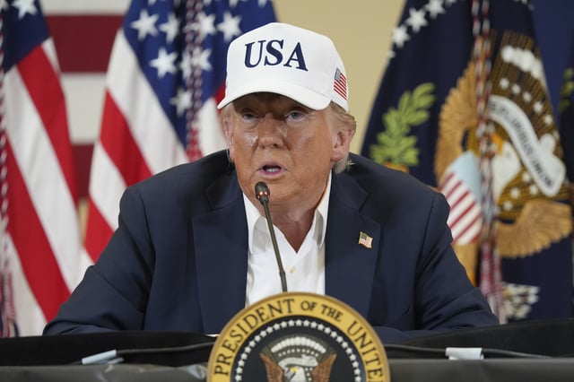 President Donald Trump speaks during a roundtable discussion with first responders and local officials at Hill Country Youth Event Center in Kerrville, Texas, during a tour to observe flood damage, Friday, July 11, 2025. (AP Photo/Jacquelyn Martin)