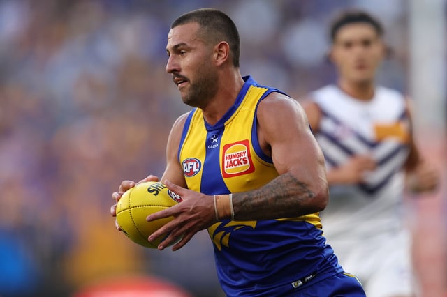 PERTH, AUSTRALIA - MARCH 30: Jack Graham of the Eagles in action during the round three AFL match between West Coast Eagles and Fremantle Dockers at Optus Stadium, on March 30, 2025, in Perth, Australia. (Photo by Paul Kane/Getty Images)