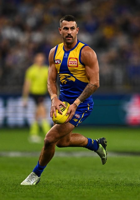 PERTH, AUSTRALIA - MAY 03: Jack Graham of the Eagles runs with the ball during the 2025 AFL Round 08 match between the West Coast Eagles and the Melbourne Demons at Optus Stadium on May 3, 2025 in Perth, Australia. (Photo by Daniel Carson/AFL Photos via Getty Images)