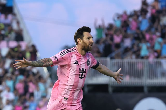 Lionel Messi celebrates after scoring his first goal on Saturday.